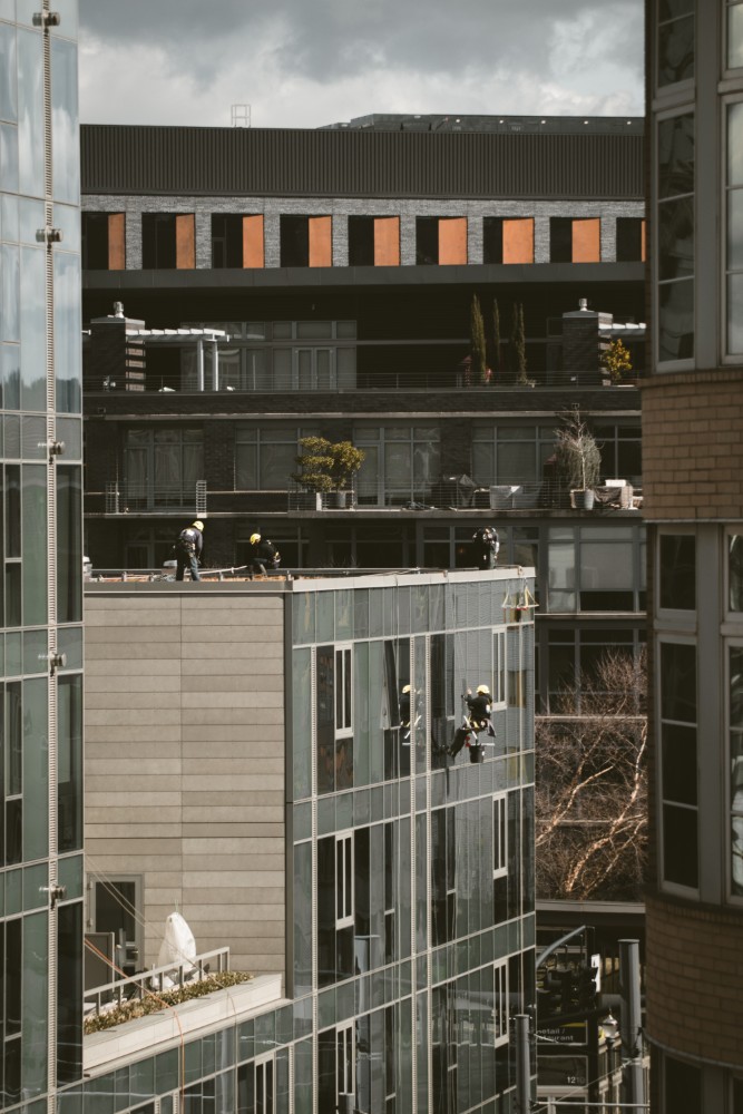 Construction workers scale building in Portland, Oregon