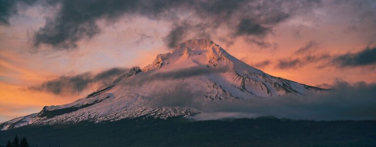 Mt Hood in Oregon at Sunrise covered by clouds